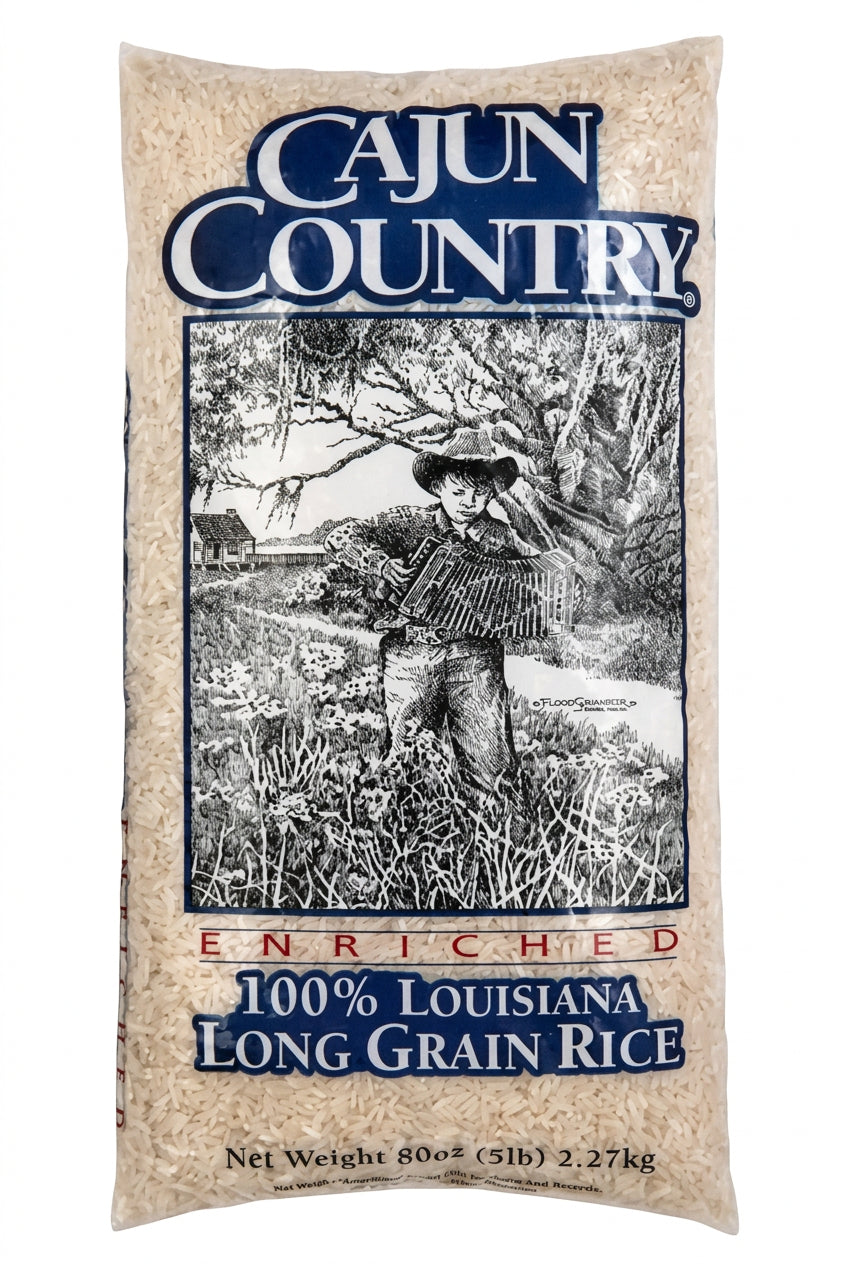 A bag of Cajun Country Long Grain Rice with a black and white image of rice fields and a tree in the background.